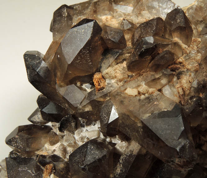 Quartz var. Smoky Quartz (Dauphin-law twins) on Microcline from Moat Mountain, west of North Conway, Carroll County, New Hampshire