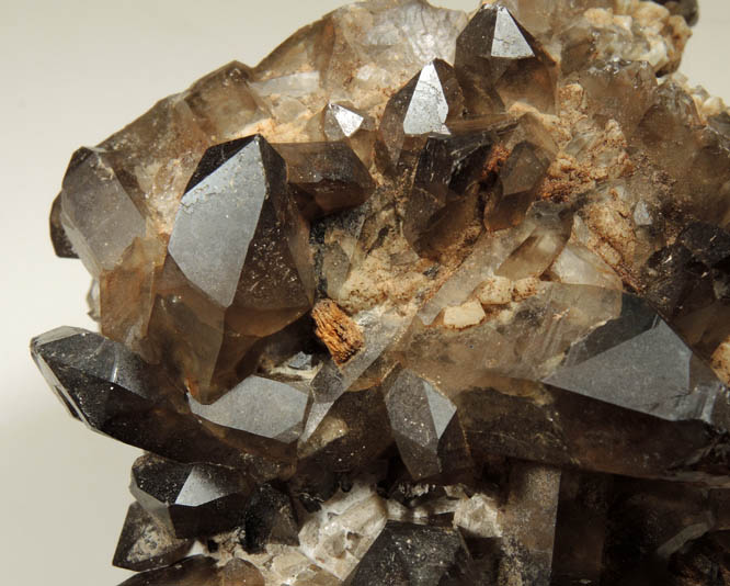 Quartz var. Smoky Quartz (Dauphiné-law twins) on Microcline from Moat Mountain, west of North Conway, Carroll County, New Hampshire