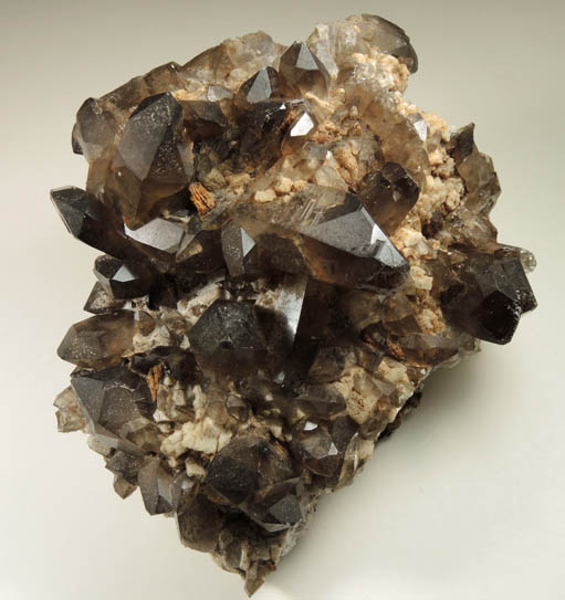 Quartz var. Smoky Quartz (Dauphin-law twins) on Microcline from Moat Mountain, west of North Conway, Carroll County, New Hampshire