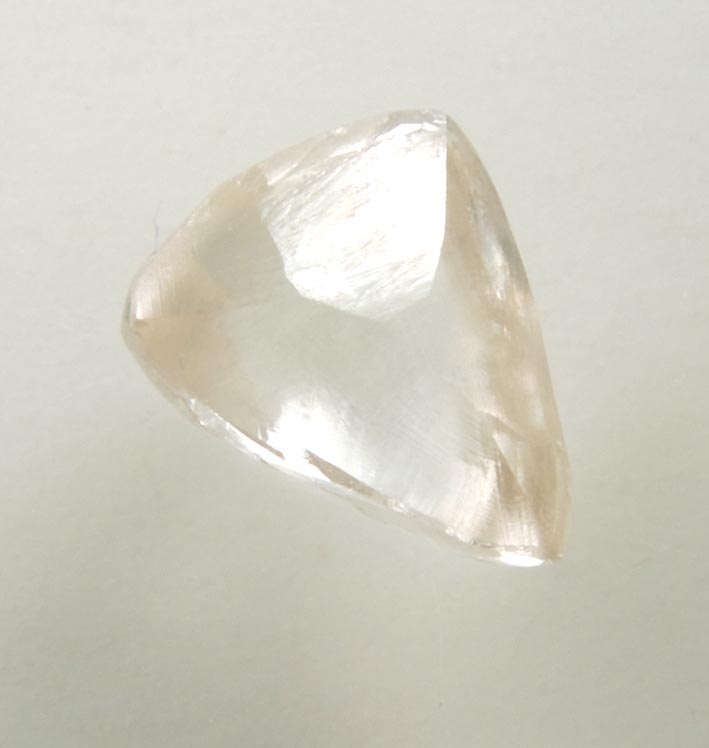 Diamond (0.92 carat pale-brown triangular crystal) from Argyle Mine, Kimberley, Western Australia, Australia