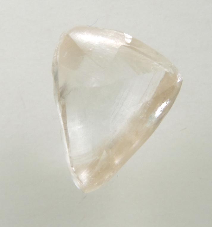 Diamond (0.92 carat pale-brown triangular crystal) from Argyle Mine, Kimberley, Western Australia, Australia