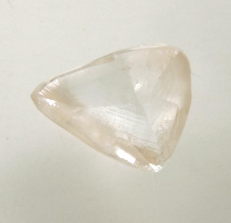 Diamond (0.92 carat pale-brown triangular crystal) from Argyle Mine, Kimberley, Western Australia, Australia