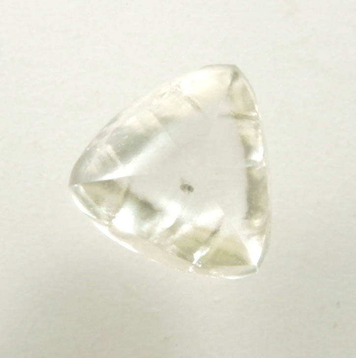 Diamond (0.65 carat cuttable yellow distorted triangular crystal) from Orapa Mine, south of the Makgadikgadi Pans, Botswana