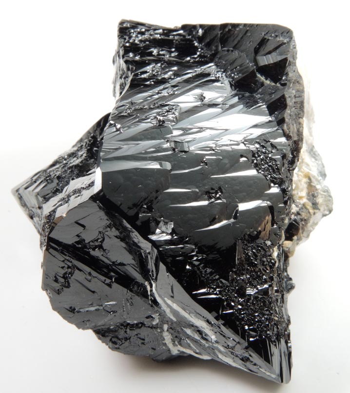 Cassiterite (twinned crystals) on Muscovite from Xuebaoding Mountain near Pingwu, Sichuan Province, China