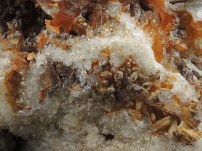 Wulfenite and Limonite on Quartz with minor Pyromorphite from Manhan Lead Mines, Loudville District, 3 km northwest of Easthampton, Hampshire County, Massachusetts