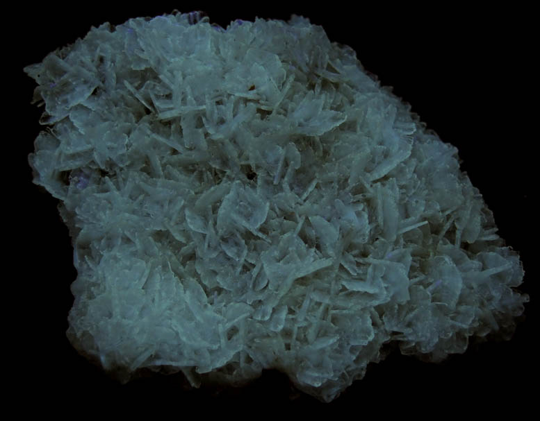 Photo below under shortwave ultraviolet illumination of Barite on Sphalerite with Bitumen from Minerva #1 Mine, Cave-in-Rock District, Hardin County, Illinois Barite on Sphalerite with Bitumen from Minerva #1 Mine, Cave-in-Rock District, Hardin County, Illinois
