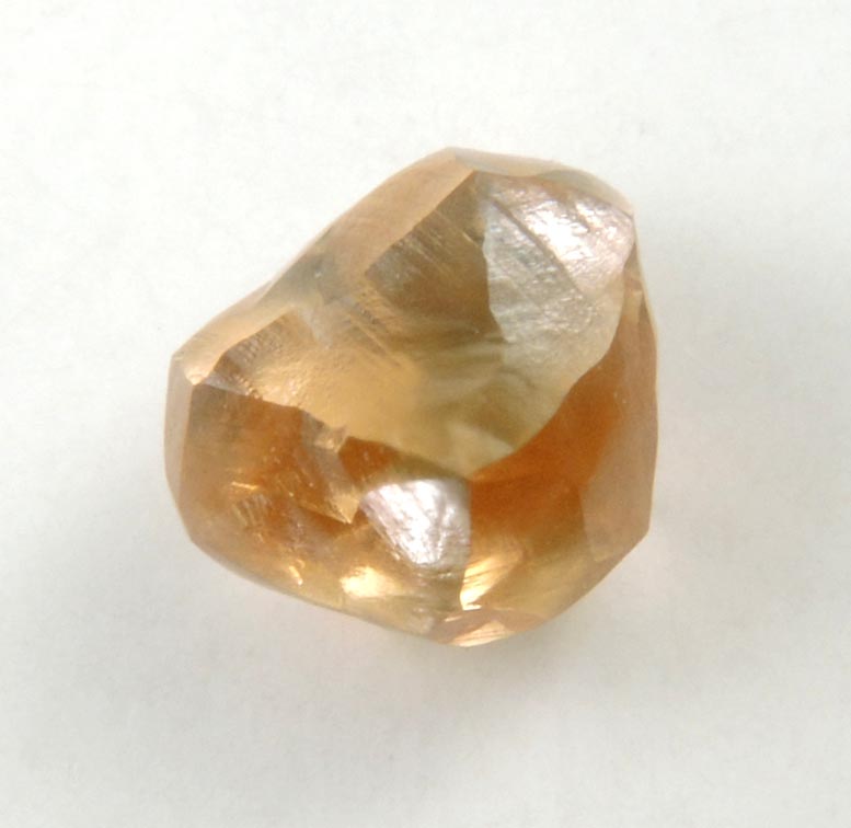 Diamond (1 carat orange-brown distorted dodecahedral crystal) from Northern Cape Province, South Africa