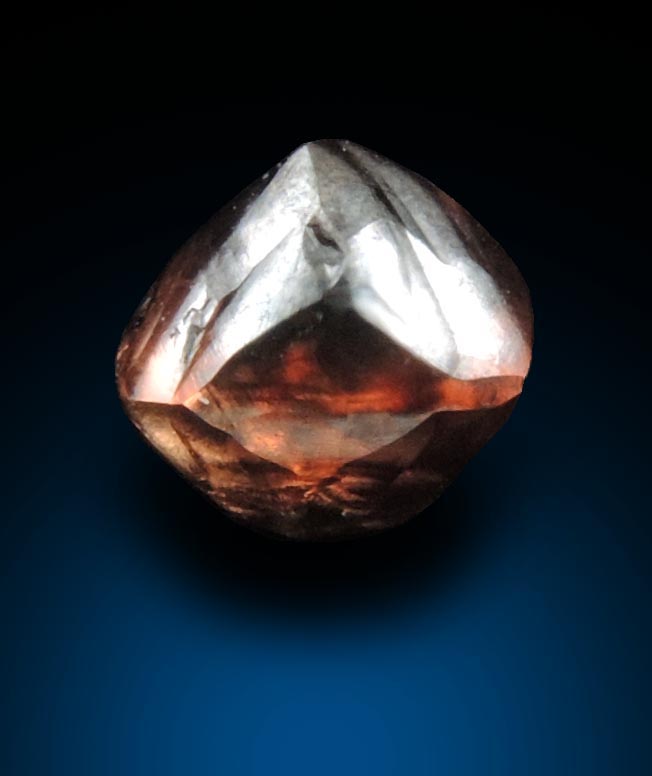 Diamond (1.04 carat red-brown distorted octahedral crystal) from Northern Cape Province, South Africa