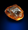 Diamond (1.09 carat fancy-orange distorted dodecahedral crystal) from Northern Cape Province, South Africa