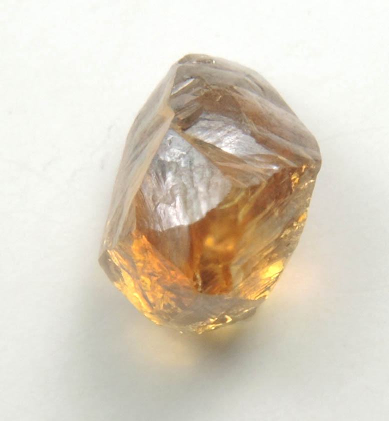 Diamond (1.09 carat fancy-orange distorted dodecahedral crystal) from Northern Cape Province, South Africa