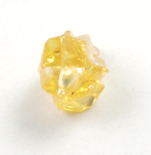 Diamond (0.16 carat fancy-yellow cavernous crystal) from Mbuji-Mayi (Miba), 300 km east of Tshikapa, Democratic Republic of the Congo