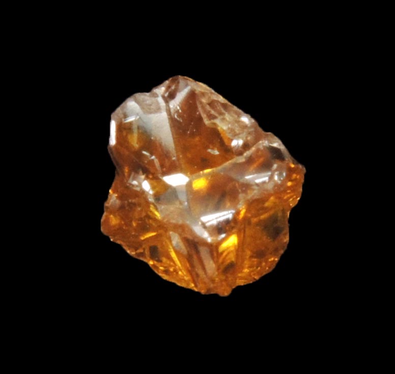 Diamond (0.51 carat fancy intense-yellow cavernous crystal) from Mbuji-Mayi (Miba), 300 km east of Tshikapa, Democratic Republic of the Congo