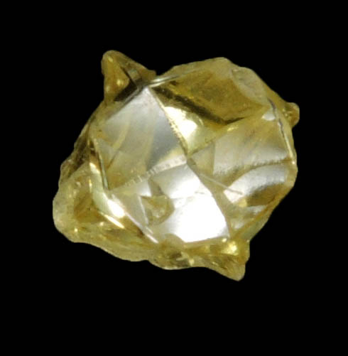 Diamond (0.40 carat fancy intense-yellow cavernous crystal) from Mbuji-Mayi (Miba), 300 km east of Tshikapa, Democratic Republic of the Congo