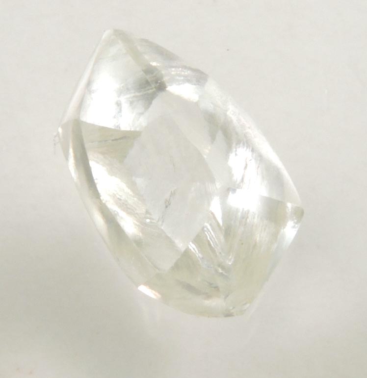 Diamond (1.40 carat cuttable slightly-yellow elongated crystal) from Lunda Norte, Angola