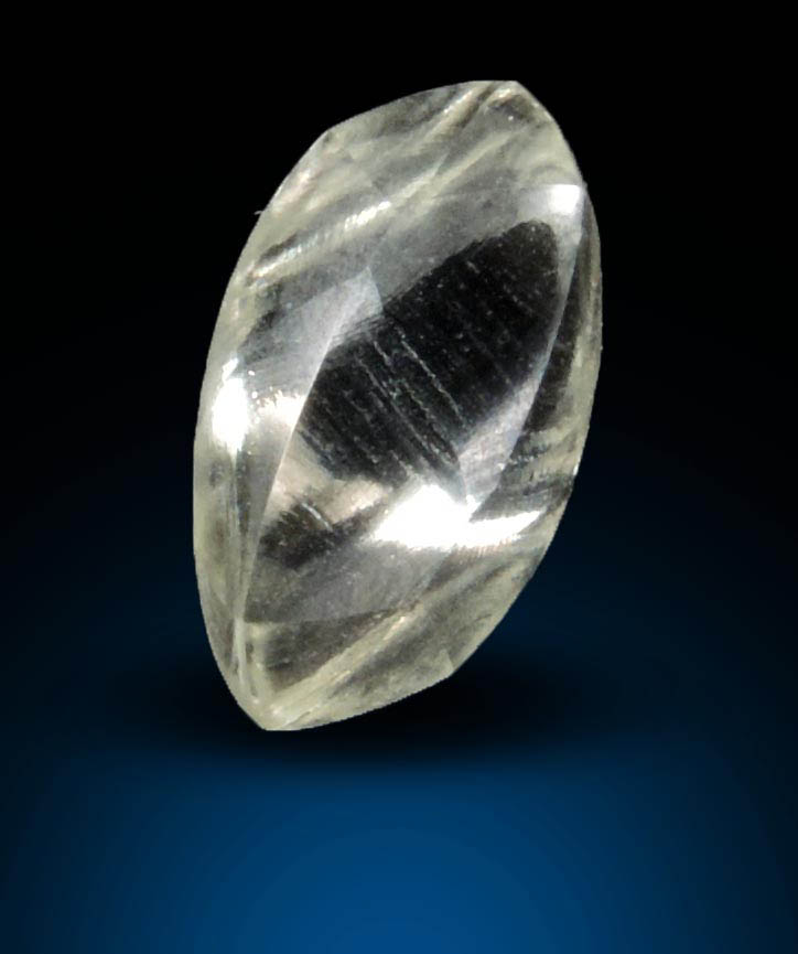 Diamond (1.43 carat cuttable slightly-yellow elongated crystal) from Lunda Norte, Angola