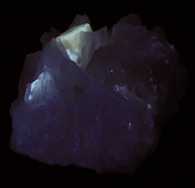Photo below under shortwave ultraviolet illumination of Fluorite on Celestine from White Rock Quarry, Clay Center, Ottawa County, Ohio Fluorite on Celestine from White Rock Quarry, Clay Center, Ottawa County, Ohio