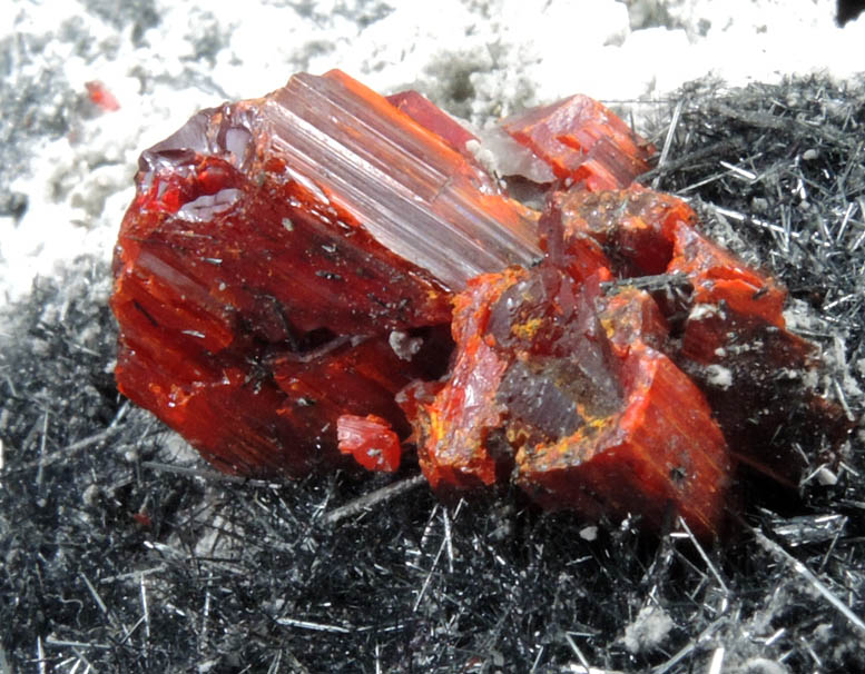 Realgar on Stibnite from Baia Sprie, Shaft 5, Level 280, Maramures, Romania