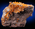 Wulfenite on Barite from Rowley Mine, 20 km northwest of Theba, Painted Rock Mountains, Maricopa County, Arizona