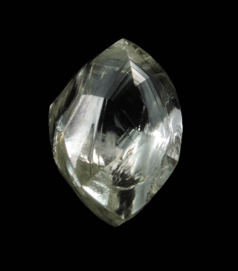 Diamond (1.60 carat yellow cuttable elongated dodecahedral crystal) from Sakha (Yakutia) Republic, Siberia, Russia