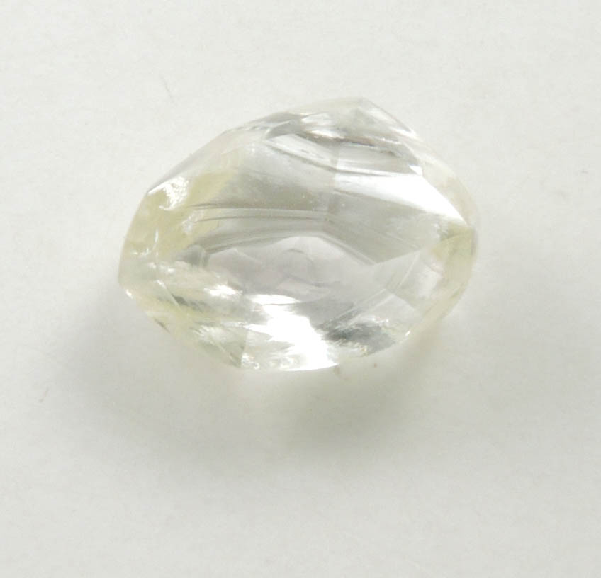 Diamond (1.60 carat yellow cuttable elongated dodecahedral crystal) from Sakha (Yakutia) Republic, Siberia, Russia