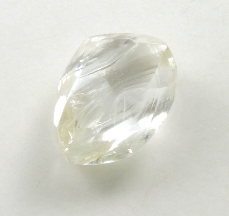 Diamond (1.60 carat yellow cuttable elongated dodecahedral crystal) from Sakha (Yakutia) Republic, Siberia, Russia