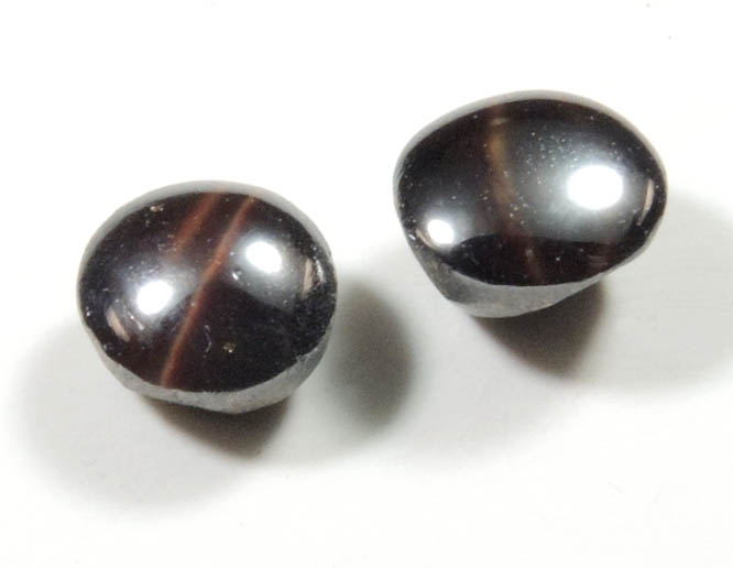 Rutile var. Cat's-Eye (two polished cabochons totaling 1.78 carats) from Sri Lanka
