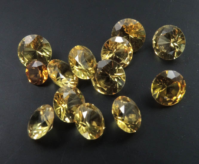 Synthetic Yellow Topaz (13 faceted gemstones totaling 3.63 carats) from Brazil