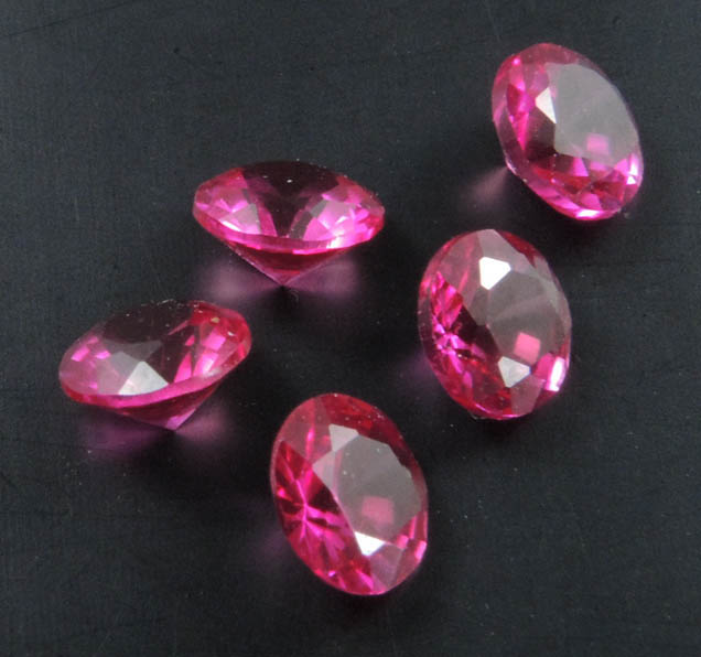 Synthetic Ruby (5 faceted gemstones totaling 1.56 carats) from India