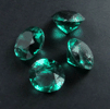 Synthetic Emerald (4 faceted gemstones totaling 0.96 carats) from India