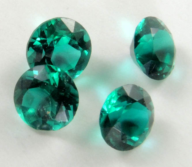 Synthetic Emerald (4 faceted gemstones totaling 0.96 carats) from India