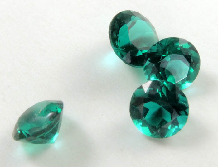 Synthetic Emerald (4 faceted gemstones totaling 0.96 carats) from India