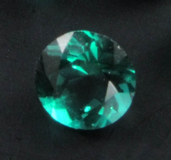 Synthetic Emerald (4 faceted gemstones totaling 0.96 carats) from India