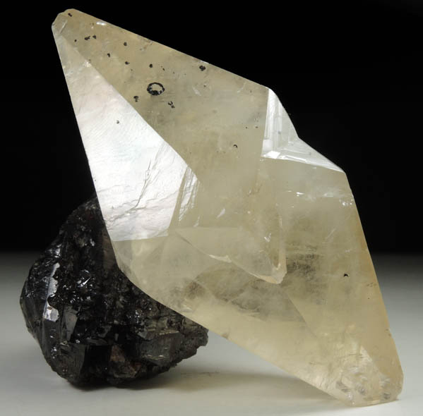 Calcite (twinned crystals) on Sphalerite from Elmwood Mine, Carthage, Smith County, Tennessee