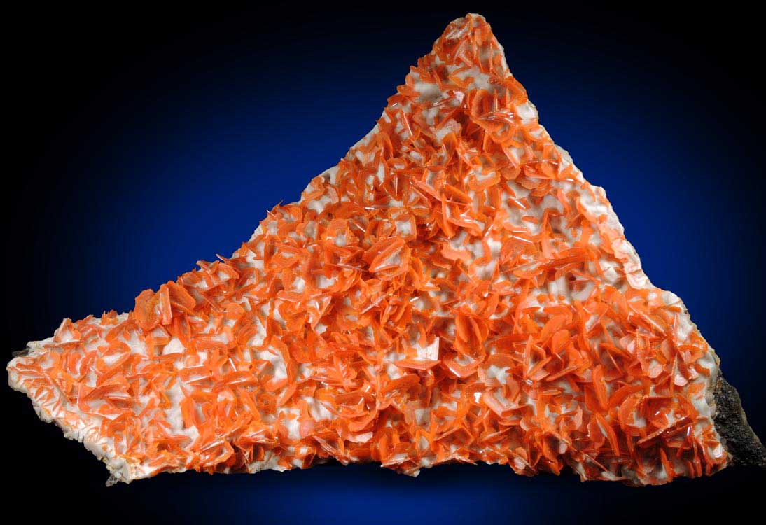 Wulfenite on Calcite from Jianshan Mine, Kuruktag Mountains, 300 km southeast of rmqi, Shanshan County, Xinjiang Uygur Region, China