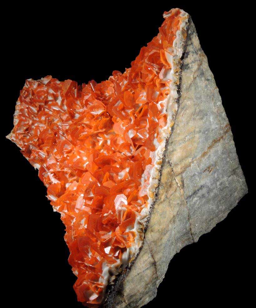 Wulfenite on Calcite from Jianshan Mine, Kuruktag Mountains, 300 km southeast of rmqi, Shanshan County, Xinjiang Uygur Region, China