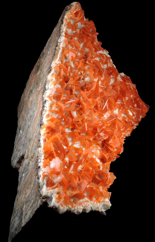 Wulfenite on Calcite from Jianshan Mine, Kuruktag Mountains, 300 km southeast of rmqi, Shanshan County, Xinjiang Uygur Region, China