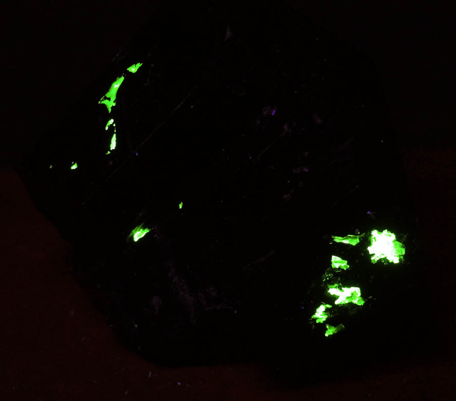 Photo below under shortwave ultraviolet illumination of Schorl Tourmaline with Hyalite Opal from Erongo Mountains, 20 km north of Usakos, Damaraland, Namibia Schorl Tourmaline with Hyalite Opal from Erongo Mountains, 20 km north of Usakos, Damaraland, Namibia