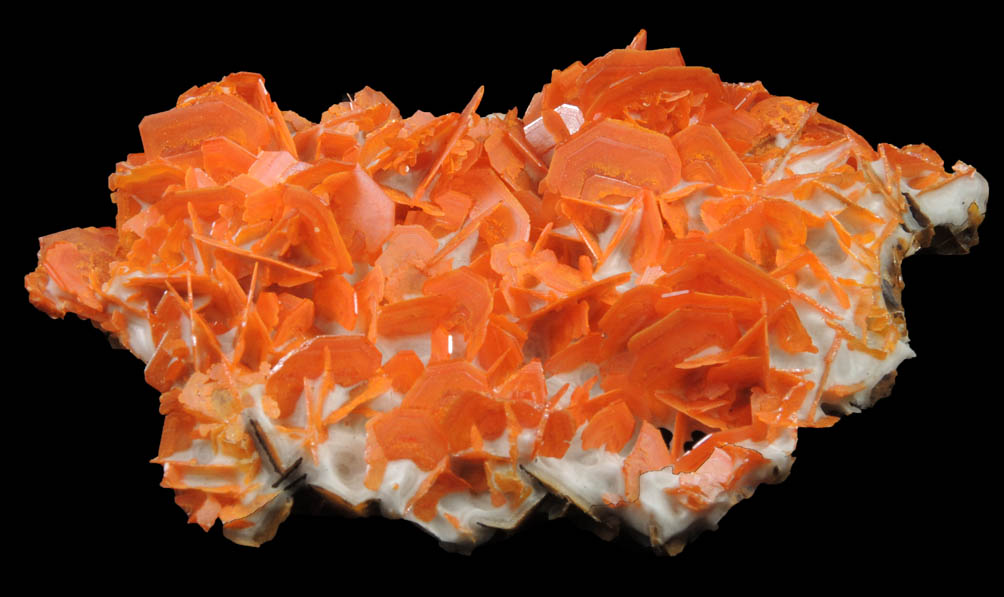 Wulfenite on Calcite from Jianshan Mine, Kuruktag Mountains, 300 km southeast of rmqi, Shanshan County, Xinjiang Uygur Region, China