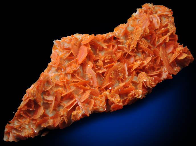 Wulfenite on Calcite from Jianshan Mine, Kuruktag Mountains, 300 km southeast of rmqi, Shanshan County, Xinjiang Uygur Region, China