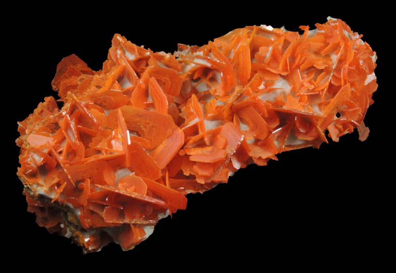 Wulfenite on Calcite from Jianshan Mine, Kuruktag Mountains, 300 km southeast of rmqi, Shanshan County, Xinjiang Uygur Region, China