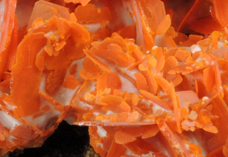 Wulfenite on Calcite from Jianshan Mine, Kuruktag Mountains, 300 km southeast of rmqi, Shanshan County, Xinjiang Uygur Region, China