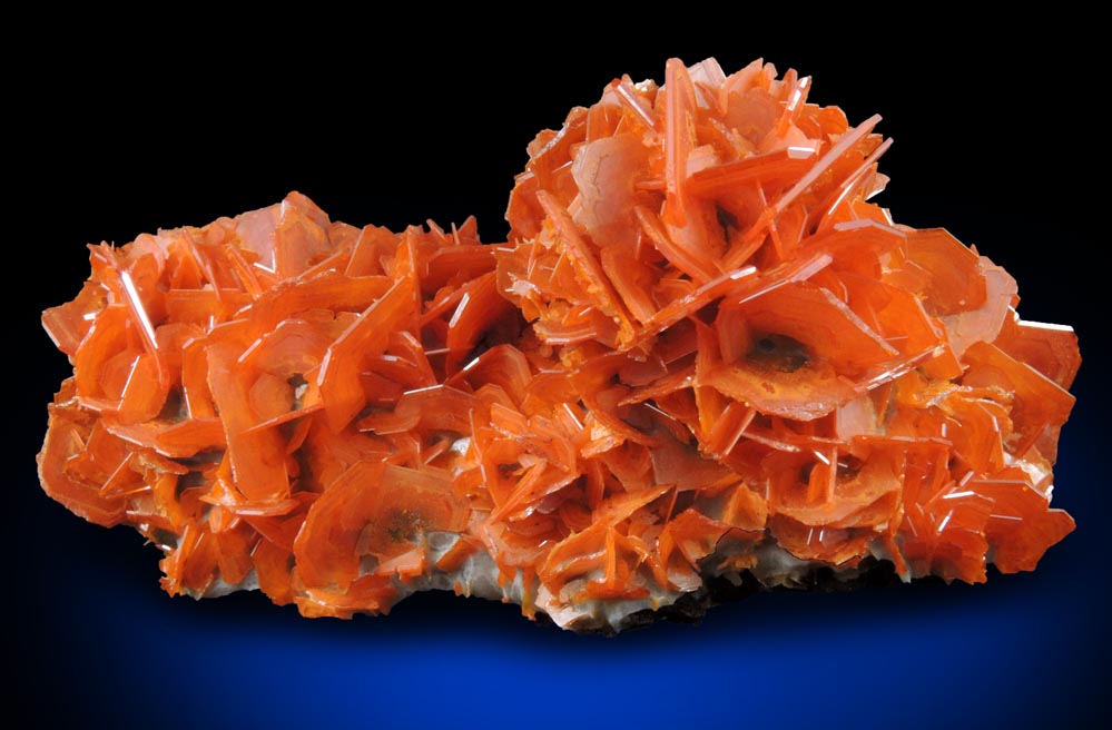 Wulfenite on Calcite from Jianshan Mine, Kuruktag Mountains, 300 km southeast of rmqi, Shanshan County, Xinjiang Uygur Region, China