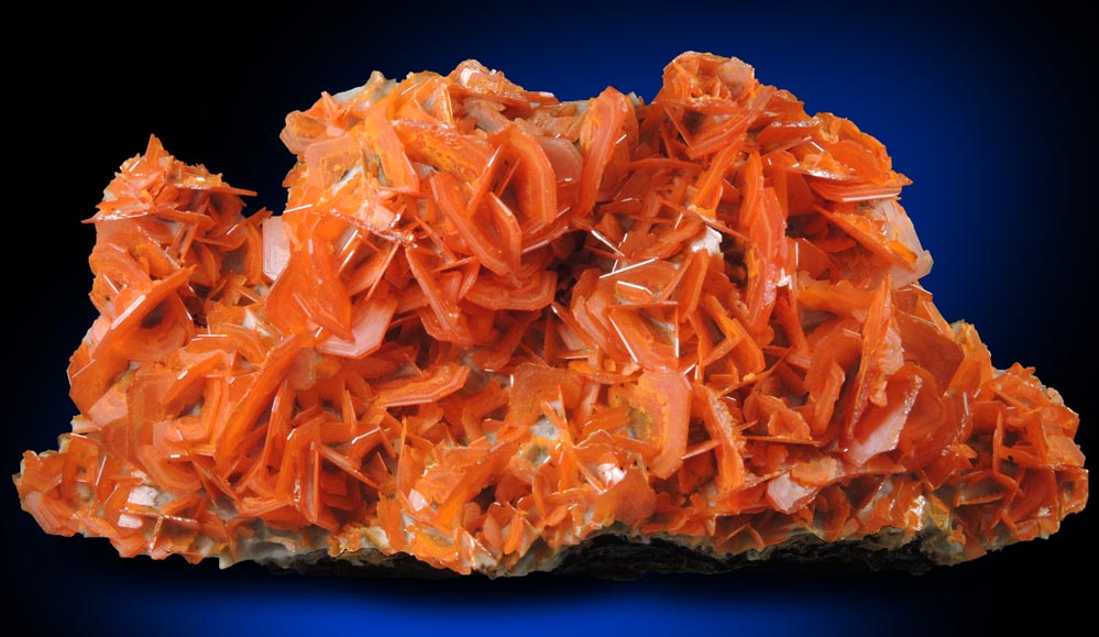 Wulfenite on Calcite from Jianshan Mine, Kuruktag Mountains, 300 km southeast of rmqi, Shanshan County, Xinjiang Uygur Region, China