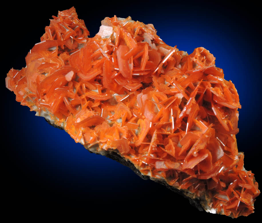 Wulfenite on Calcite from Jianshan Mine, Kuruktag Mountains, 300 km southeast of rmqi, Shanshan County, Xinjiang Uygur Region, China