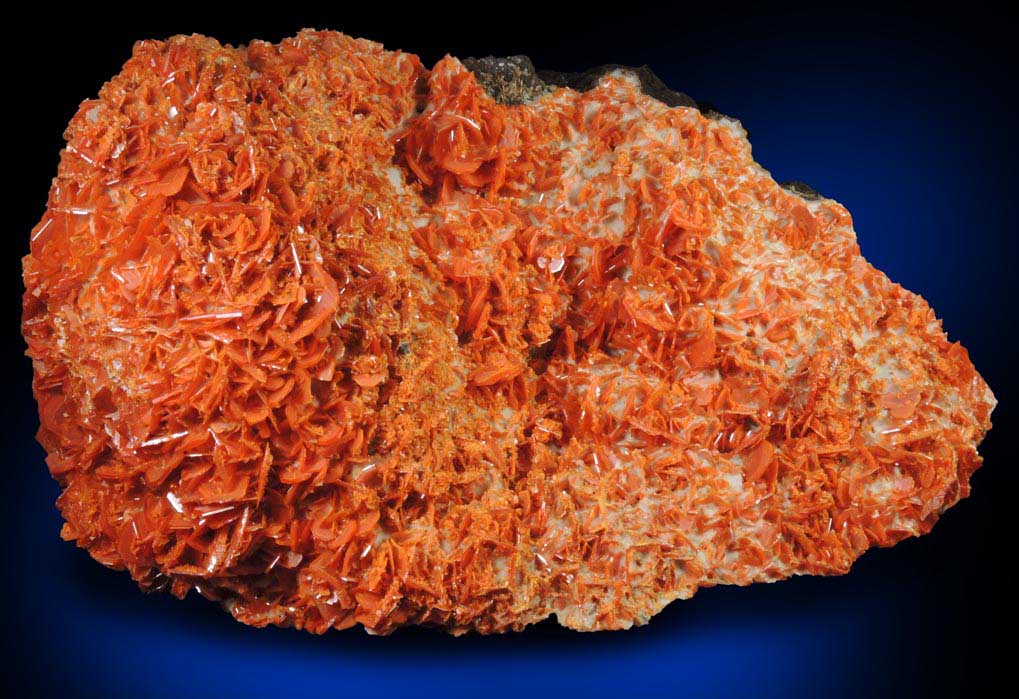 Wulfenite on Calcite from Jianshan Mine, Kuruktag Mountains, 300 km southeast of rmqi, Shanshan County, Xinjiang Uygur Region, China