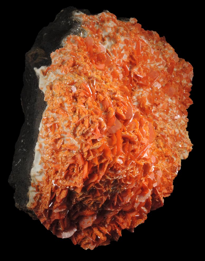 Wulfenite on Calcite from Jianshan Mine, Kuruktag Mountains, 300 km southeast of rmqi, Shanshan County, Xinjiang Uygur Region, China