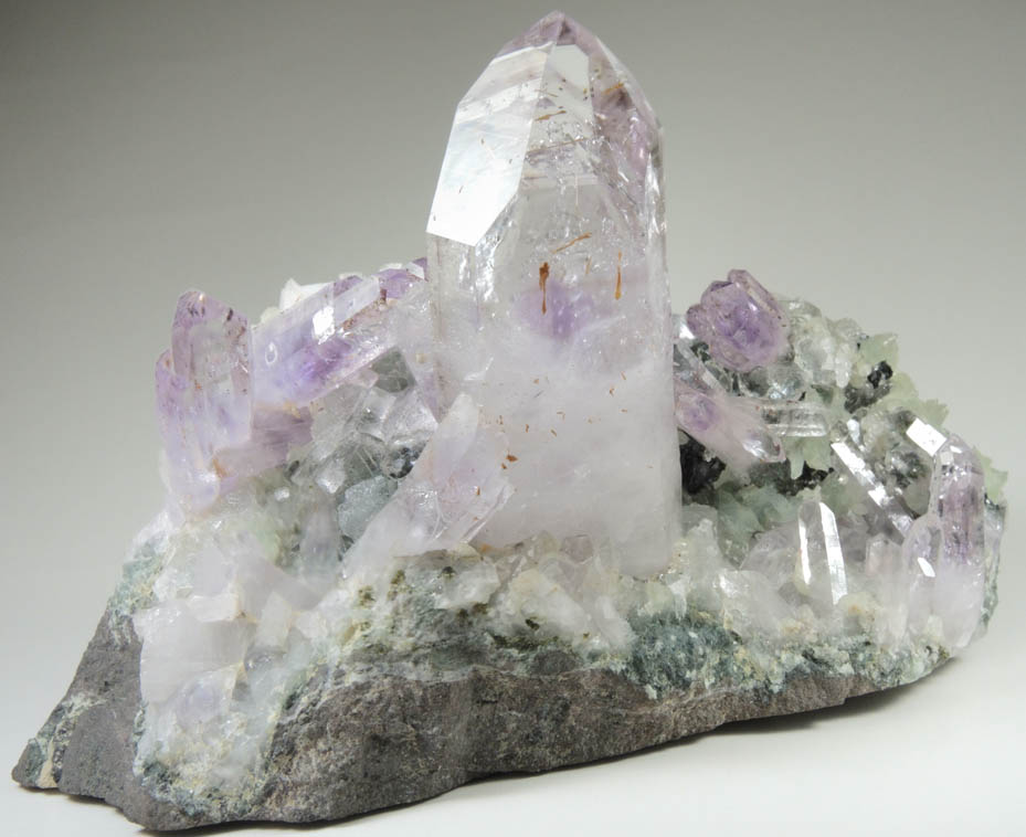 Quartz var. Amethyst with Hematite inclusions on Prehnite from Goboboseb Mountains, 43 km west of Brandberg Mountain, Erongo region, Namibia