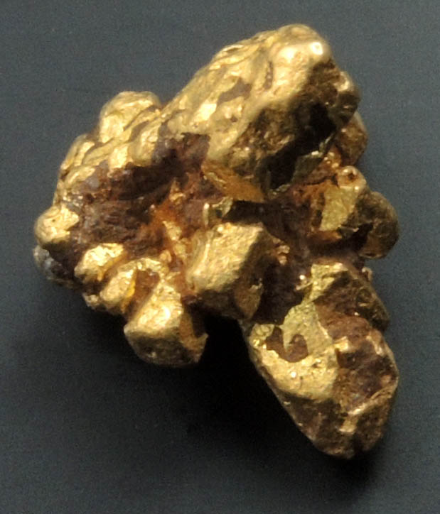 Gold (alluvial crystals) from Duiwels Kantoor (Kaapsche Hoop or Kaapsehoop), 34 km northwest of Barberton, Mpumalanga, South Africa