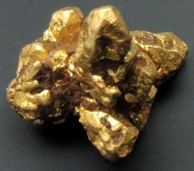 Gold (alluvial crystals) from Duiwels Kantoor (Kaapsche Hoop or Kaapsehoop), 34 km northwest of Barberton, Mpumalanga, South Africa