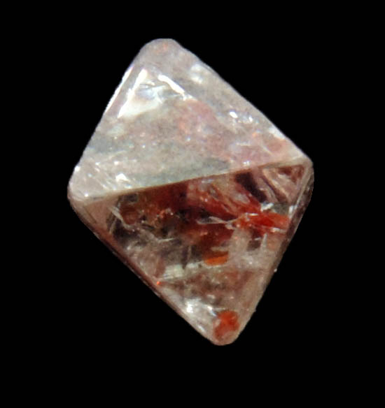 Diamond (0.32 carat octahedral crystal with red inclusions) from Sakha (Yakutia) Republic, Siberia, Russia